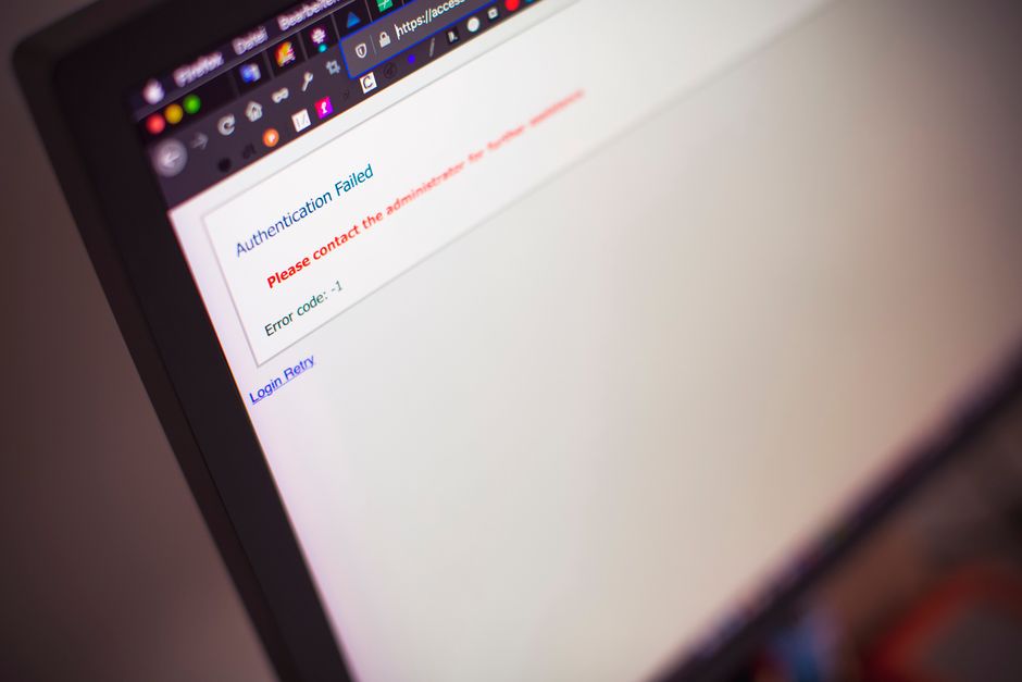 A close-up view of a computer screen displaying an error message that reads 'Authentication Failed' in blue text, with an accompanying red warning that states 'Please contact the administrator' and an error code '-1' below in black. The browser window shows multiple tabs open at the top, with some icons visible, including a padlock icon, indicating secure sites. The screen background is predominantly white with minimal other visible content, and the surrounding environment is blurred, suggesting an indoor setting. This image highlights issues related to digital access and security, which can be relevant in the context of managing online waste disposal or scheduling rubbish removal services. The scenario reflects the importance of secure, reliable online systems—such as those used by rubbish removal companies like Rubbish Removal Mayfair—for coordinating waste collection or complying with local regulations in Mayfair, including Westminster Council rules for bulky waste. The focus on the error message emphasizes the necessity of digital infrastructure in modern waste management and private disposal operations, supporting service efficiency and communication.